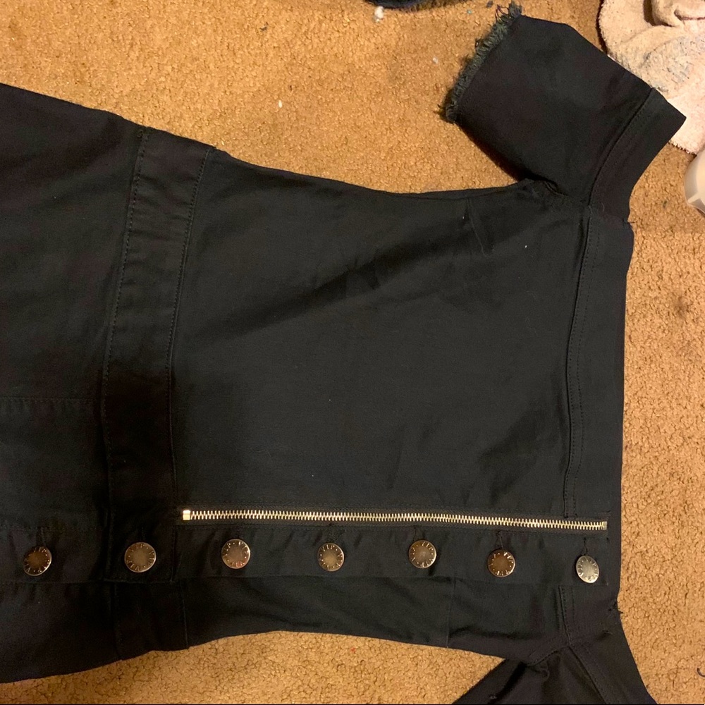 A nice Jean jumper with gold zipper and buttons